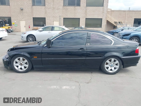 2002 BMW 3 Series 325Ci with VIN WBABN33482JW53230, listed as a IAAI auction lot 41912031 with 211,631 mi miles. Bid and sale history available at carsss.com. Image 14.