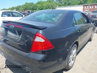 2012 Ford Fusion SE z VIN 3FAHP0HA5CR241364, wystawiony jako IAAI lot #42388912 z przebiegiem 130 126 mil mil oraz . Historia ofert i sprzedaży dostępna na DreamBid. Obrazek 4.