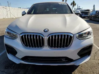 2020 BMW X4 xDrive30i with VIN 5UX2V1C09L9B97540, listed as a Copart auction lot 73984983 with 64,343 mi miles. Bid and sale history available at carsss.com. Image 5.