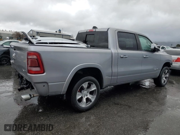 2020 Ram 1500 Laramie with VIN 1C6SRFJM7LN355667, listed as a Copart auction lot 45062385 with 121,512 mi miles and Salvage title. Bid and sale history available at DreamBid. Image 3.