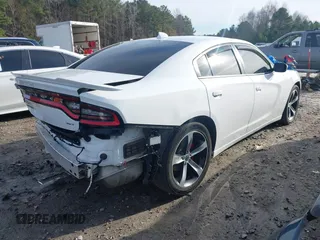 2017 Dodge Charger SXT with VIN 2C3CDXHG8HH634521, listed as a IAAI auction lot 41064103 with 150,284 mi miles. Bid and sale history available at carsss.com. Image 4.