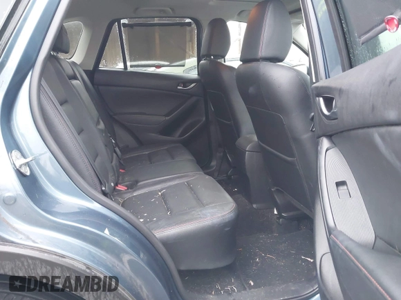 2015 Mazda CX-5 Grand Touring with VIN JM3KE4DY0F0493969, listed as a IAAI auction lot 41581885 with 71,014 mi miles. Bid and sale history available at carsss.com. Image 8.
