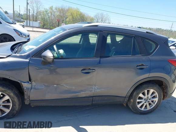 2016 Mazda CX-5 Sport with VIN JM3KE2BY2G0781565, listed as a IAAI auction lot 42042256 with 182,186 mi miles. Bid and sale history available at carsss.com. Image 15.