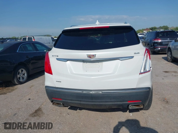 2018 Cadillac XT5 Luxury FWD with VIN 1GYKNCRS2JZ174756, listed as a IAAI auction lot 42192036 with 63,684 mi miles and . Bid and sale history available at carsss.com. Image 16.