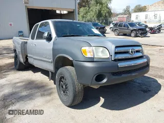 2003 Toyota Tundra SR5 with VIN 5TBRT34163S353209, listed as a IAAI auction lot 41819411 with 272,127 mi miles. Bid and sale history available at carsss.com. Image 1.