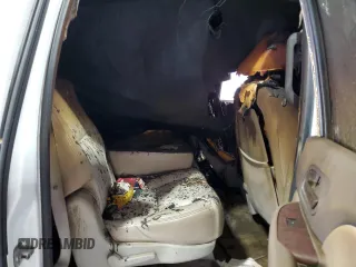 2007 Chevrolet Suburban LT с VIN 1GNFK16327J314188, выставлен на аукционе Copart как лот 56455285 с пробегом Не указан миль и Списание • Salvage title. История ставок и продаж доступна на DreamBid. Изображение 11.
