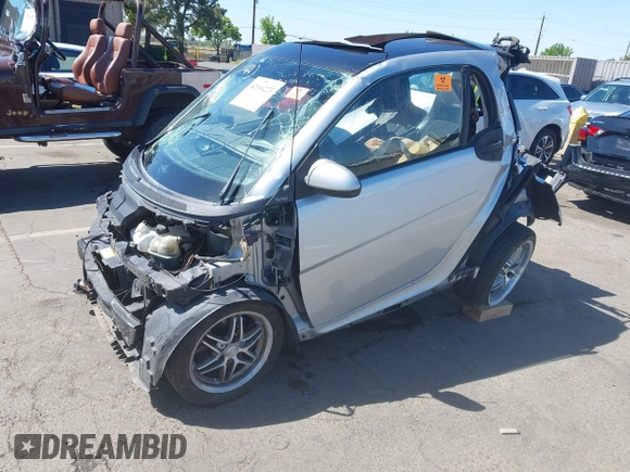 2009 Smart fortwo Pure with VIN WMEEJ31X09K282711, listed as a IAAI auction lot 42164223 with Not provided miles and . Bid and sale history available at DreamBid. Image 2.