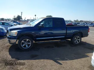 2007 Dodge 1500 SLT with VIN 1D7HU18207J606248, listed as a IAAI auction lot 42141047 with 128,821 mi miles. Bid and sale history available at carsss.com. Image 14.