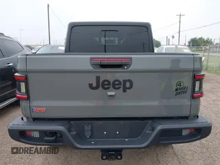 2022 Jeep Gladiator Texas Trail z VIN 1C6HJTAG2NL176011, wystawiony jako IAAI lot #42193864 z przebiegiem 27 219 mil mil oraz . Historia ofert i sprzedaży dostępna na DreamBid. Obrazek 17.