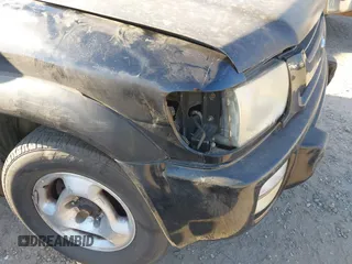 2000 Infiniti QX4 z VIN JNRAR07YXYW085007, wystawiony jako IAAI lot #41671667 z przebiegiem 309 951 mil mil oraz . Historia ofert i sprzedaży dostępna na DreamBid. Obrazek 13.