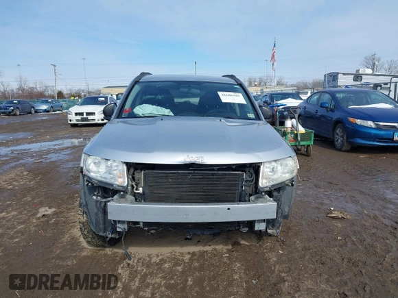 2012 Jeep Compass Sport with VIN 1C4NJCBA3CD601569, listed as a IAAI auction lot 41606565 with 126,630 mi miles. Bid and sale history available at carsss.com. Image 12.