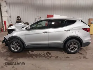 2017 Hyundai Santa Fe 2.4L with VIN 5XYZTDLB3HG488692, listed as a IAAI auction lot 42289211 with 82,290 mi miles and . Bid and sale history available at DreamBid. Image 15.
