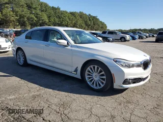 2016 BMW 7 Series 740i with VIN WBA7E2C54GG547970, listed as a Copart auction lot 71097393 with 60,464 mi miles. Bid and sale history available at carsss.com. Image 4.