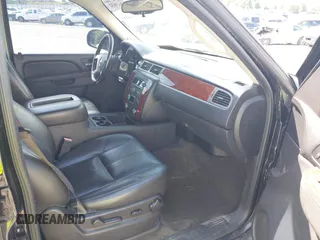2013 Chevrolet Suburban LT with VIN 1GNSCJE03DR121628, listed as a IAAI auction lot 42629432 with 223,761 mi miles and . Bid and sale history available at DreamBid. Image 5.