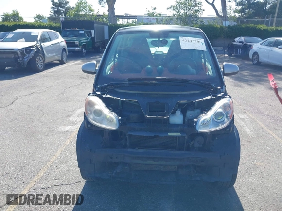 2013 Smart fortwo Pure z VIN WMEEJ3BAXDK632221, wystawiony jako IAAI lot #42243706 z przebiegiem 75 815 mil mil oraz . Historia ofert i sprzedaży dostępna na DreamBid. Obrazek 13.