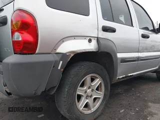 2004 Jeep Liberty Sport with VIN 1J4GL48K74W318861, listed as a IAAI auction lot 41706222 with 211,089 mi miles. Bid and sale history available at carsss.com. Image 19.