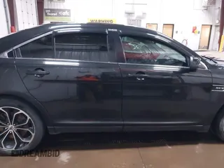 2015 Ford Taurus SHO with VIN 1FAHP2KT6FG137418, listed as a IAAI auction lot 42256452 with 140,335 mi miles and . Bid and sale history available at DreamBid. Image 13.