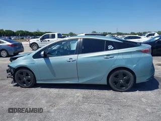2016 Toyota Prius Four z VIN JTDKARFU0G3016597, wystawiony jako IAAI lot #42034214 z przebiegiem 125 799 mil mil oraz . Historia ofert i sprzedaży dostępna na DreamBid. Obrazek 14.
