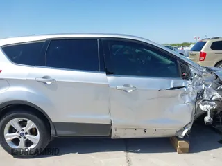 2014 Ford Escape SE с VIN 1FMCU0GX3EUA21506, выставлен на аукционе IAAI как лот 41993526 с пробегом 134 761 миль миль и . История ставок и продаж доступна на DreamBid. Изображение 14.