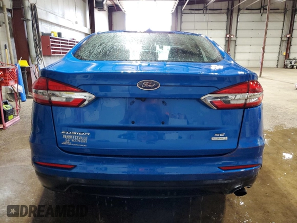 2020 Ford Fusion SE z VIN 3FA6P0HD2LR160243, wystawiony jako Copart lot #65366835 z przebiegiem 118 411 mil mil oraz Czysty tytuł • Clean title. Historia ofert i sprzedaży dostępna na DreamBid. Obrazek 6.