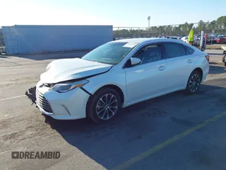 2018 Toyota Avalon XLE with VIN 4T1BK1EB8JU280176, listed as a IAAI auction lot 41632952 with 73,991 mi miles. Bid and sale history available at carsss.com. Image 2.