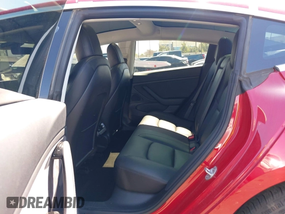 2018 Tesla Model 3 Long Range Battery with VIN 5YJ3E1EB5JF146184, listed as a IAAI auction lot 41808346 with 97,496 mi miles and . Bid and sale history available at DreamBid. Image 8.