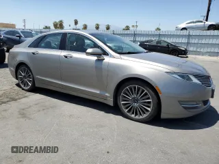 2015 Lincoln MKZ Hybrid z VIN 3LN6L2LU3FR608806, wystawiony jako Copart lot #57187835 z przebiegiem 151 462 mil mil oraz Czysty tytuł • Clean title. Historia ofert i sprzedaży dostępna na DreamBid. Obrazek 4.