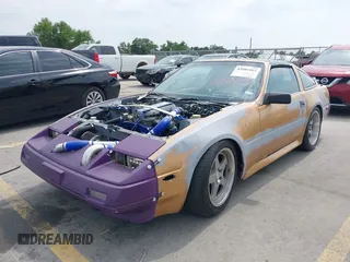 1986 Nissan 300ZX z VIN JN1HZ14S8GX144992, wystawiony jako IAAI lot #42081882 z przebiegiem 127 316 mil mil oraz . Historia ofert i sprzedaży dostępna na DreamBid. Obrazek 2.