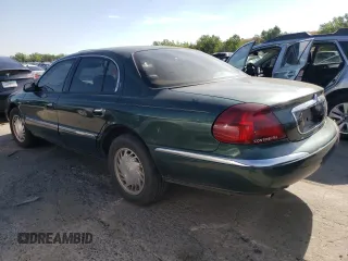 1998 Lincoln Continental with VIN 1LNFM97V8WY707809, listed as a Copart auction lot 70842654 with 175,066 mi miles and Salvage Title. Bid and sale history available at carsss.com. Image 2.