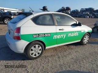 2007 Hyundai Accent GS with VIN KMHCM36C17U001726, listed as a IAAI auction lot 41962105 with 138,952 mi miles. Bid and sale history available at carsss.com. Image 4.