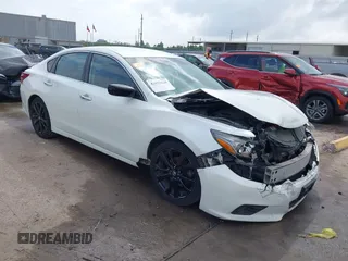 2018 Nissan Altima SR with VIN 1N4AL3AP3JC290863, listed as a IAAI auction lot 41933628 with 121,771 mi miles and . Bid and sale history available at carsss.com. Image 1.