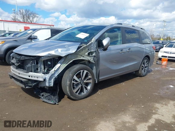2022 Honda Odyssey Touring with VIN 5FNRL6H80NB039904, listed as a IAAI auction lot 41849132 with Not Provided miles and . Bid and sale history available at DreamBid. Image 2.