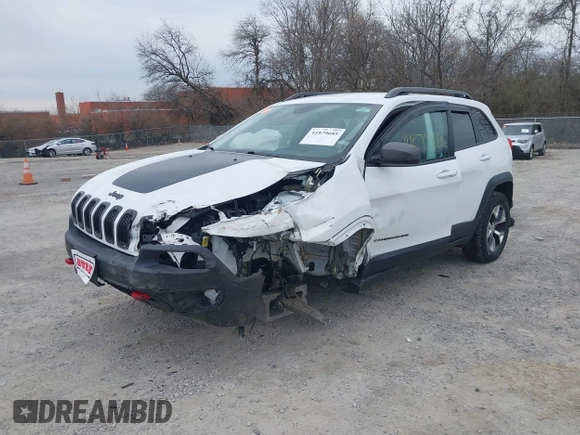 2015 Jeep Cherokee Trailhawk with VIN 1C4PJMBB7FW741365, listed as a IAAI auction lot 41879685 with 94,135 mi miles and . Bid and sale history available at carsss.com. Image 18.