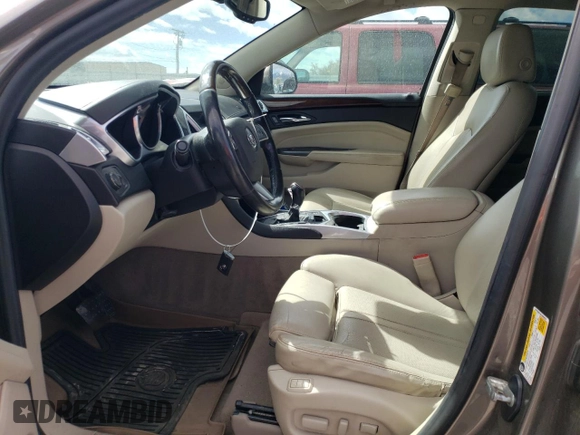 2012 Cadillac SRX Performance Collection with VIN 3GYFNEE34CS589833, listed as a Copart auction lot 56138324 with Not provided miles and Salvage title. Bid and sale history available at DreamBid. Image 7.