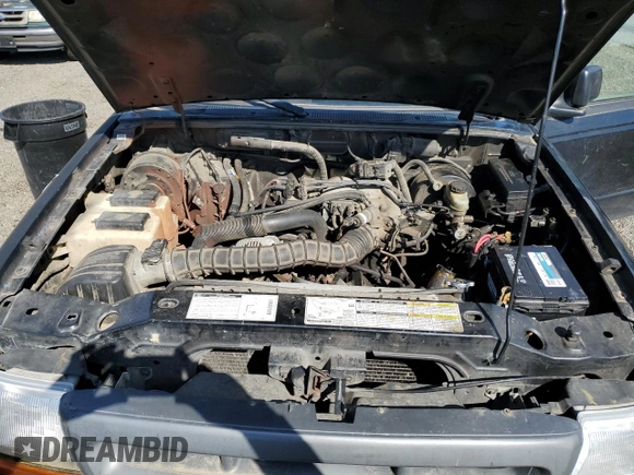 1999 Ford Ranger XL with VIN 1FTZR15V7XTA62124, listed as a Copart auction lot 55239095 with 284,087 mi miles and Clean title. Bid and sale history available at DreamBid. Image 11.