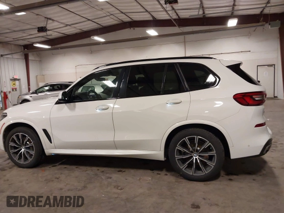 2020 BMW X5 xDrive40i with VIN 5UXCR6C01LLL66648, listed as a IAAI auction lot 42372631 with 59,770 mi miles and . Bid and sale history available at DreamBid. Image 14.