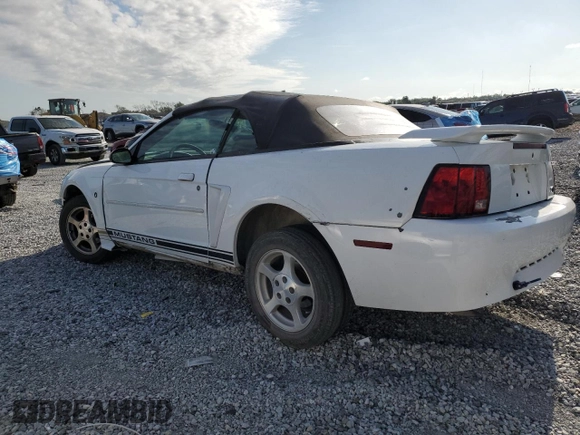 2002 Ford Mustang Deluxe with VIN 1FAFP44492F121223, listed as a Copart auction lot 62474065 with 128,984 mi miles and Salvage title. Bid and sale history available at DreamBid. Image 2.