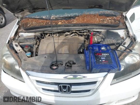 2007 Honda Odyssey EX-L with VIN 5FNRL38787B051582, listed as a IAAI auction lot 42104718 with 193,630 mi miles and . Bid and sale history available at DreamBid. Image 10.