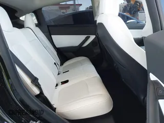 2022 Tesla Model Y Performance z VIN 7SAYGDEF0NF491586, wystawiony jako IAAI lot #42276747 z przebiegiem 117 203 mil mil oraz . Historia ofert i sprzedaży dostępna na DreamBid. Obrazek 8.