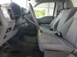 2023 Ford F-150 XL with VIN 1FTMF1C57PKF86630, listed as a Copart auction lot 59172785 with 14,840 mi miles and Salvage title. Bid and sale history available at DreamBid. Image 7.