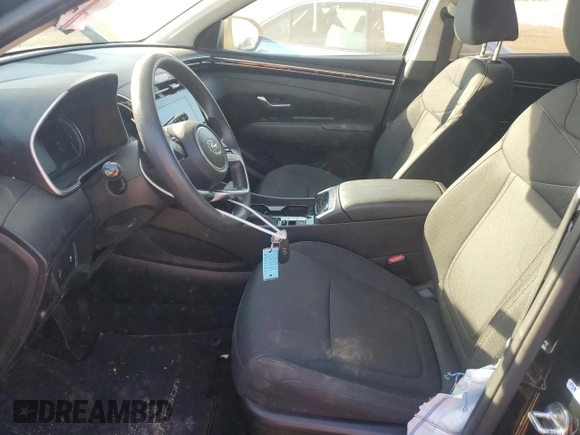 2022 Hyundai Tucson SEL with VIN 5NMJBCAE9NH137827, listed as a Copart auction lot 76742814 with 22,137 mi miles and Salvage Title. Bid and sale history available at carsss.com. Image 7.