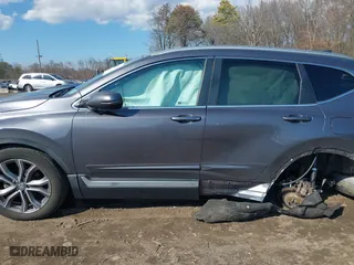 2021 Honda CR-V Touring with VIN 2HKRW2H9XMH645901, listed as a IAAI auction lot 41870446 with 22,996 mi miles. Bid and sale history available at carsss.com. Image 15.