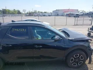 2022 Hyundai Santa Cruz SEL Premium z VIN 5NTJDDAF6NH036340, wystawiony jako IAAI lot #42062271 z przebiegiem 33 095 mil mil oraz . Historia ofert i sprzedaży dostępna na DreamBid. Obrazek 13.