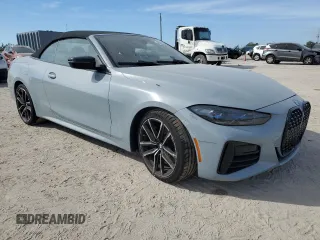 2022 BMW 4 Series M440i with VIN WBA53AT00NCK09742, listed as a Copart auction lot 42662415 with Not provided miles and Salvage title. Bid and sale history available at DreamBid. Image 4.