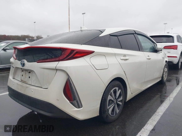 2017 Toyota Prius Plus with VIN JTDKARFP5H3004876, listed as a IAAI auction lot 41972573 with 148,670 mi miles and . Bid and sale history available at DreamBid. Image 4.
