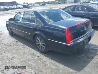 2006 Cadillac DTS 1SE with VIN 1G6KD57976U126634, listed as a IAAI auction lot 41972104 with 148,992 mi miles and . Bid and sale history available at DreamBid. Image 3.