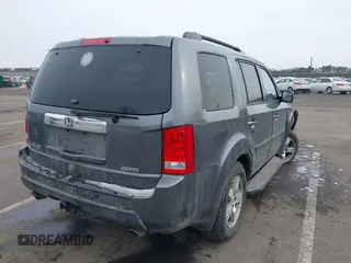 2011 Honda Pilot EX-L with VIN 5FNYF4H65BB009279, listed as a IAAI auction lot 41554301 with 226,337 mi miles and . Bid and sale history available at carsss.com. Image 4.