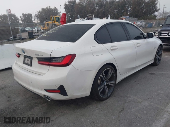 2022 BMW 3 Series 330e with VIN 3MW5P7J04N8C40865, listed as a IAAI auction lot 41635704 with 44,929 mi miles. Bid and sale history available at carsss.com. Image 4.