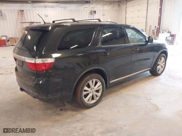 2012 Dodge Durango Crew with VIN 1C4SDJDT9CC181111, listed as a IAAI auction lot 41691801 with 124,846 mi miles. Bid and sale history available at carsss.com. Image 4.