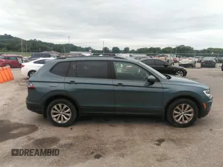 2019 Volkswagen Tiguan S z VIN 3VV1B7AXXKM121963, wystawiony jako IAAI lot #40076115 z przebiegiem 167 540 mil mil oraz . Historia ofert i sprzedaży dostępna na DreamBid. Obrazek 12.